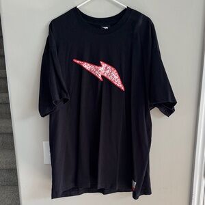 Black Tee with Red Graphic by [Brand]